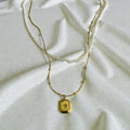 Layered Gold & Pearl Necklace