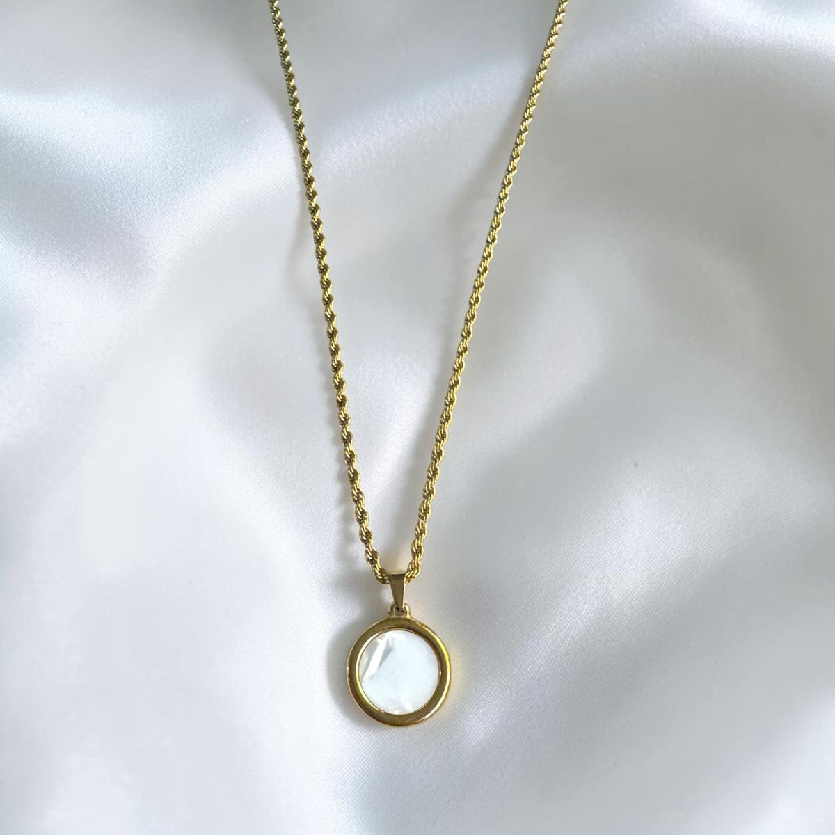 Heritage Medallion Shell Amulet